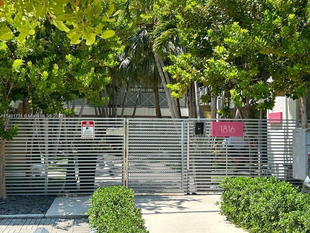 1816 Meridian Avenue, Unit 18 Miami Beach, FL 33139 - Photo 1 of 19 a view of a pathway with a house