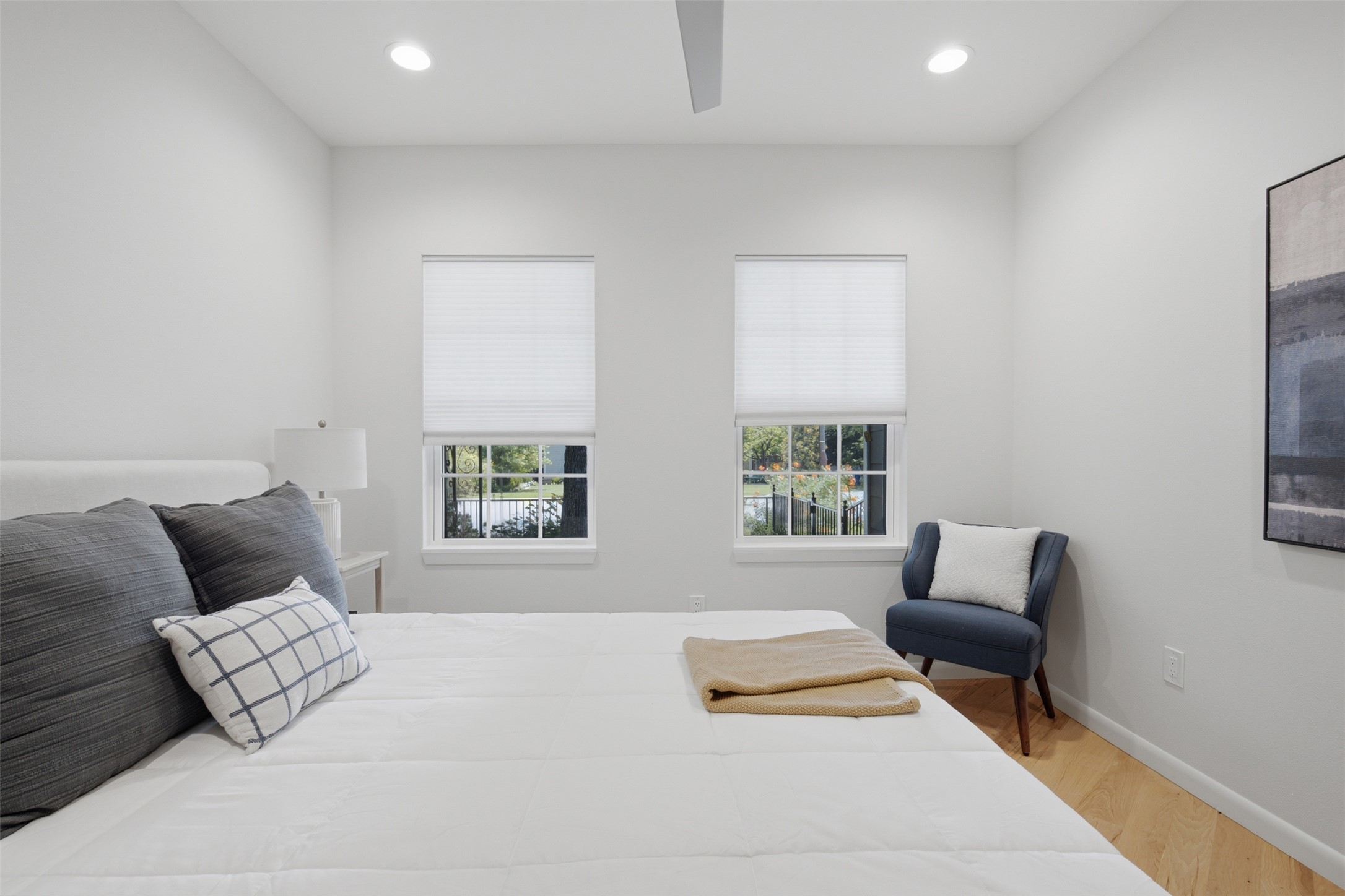 206 East 43rd Street Austin, TX 78751 - Photo 18 of 29 Canned lights, and ceiling fan are features of this primary bedroom.