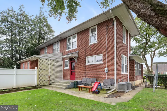 a view of backyard with a garden and slide