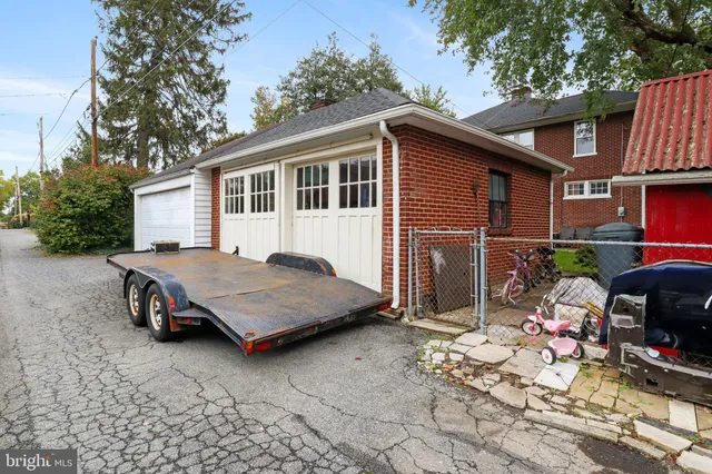 a house view with a outdoor seating