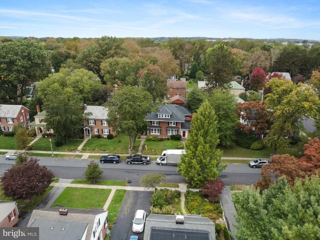 an aerial view of a house with a garden