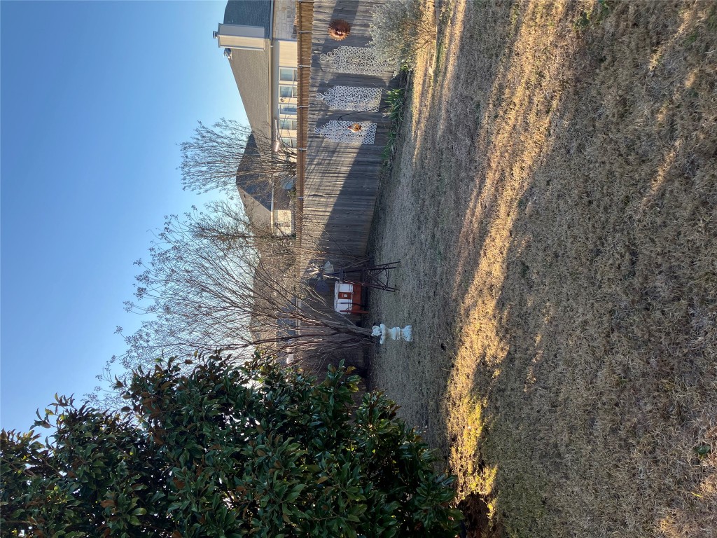 250 Engineers Pass Jarrell, TX 76537 - Photo 12 of 22 a view of a house with a yard