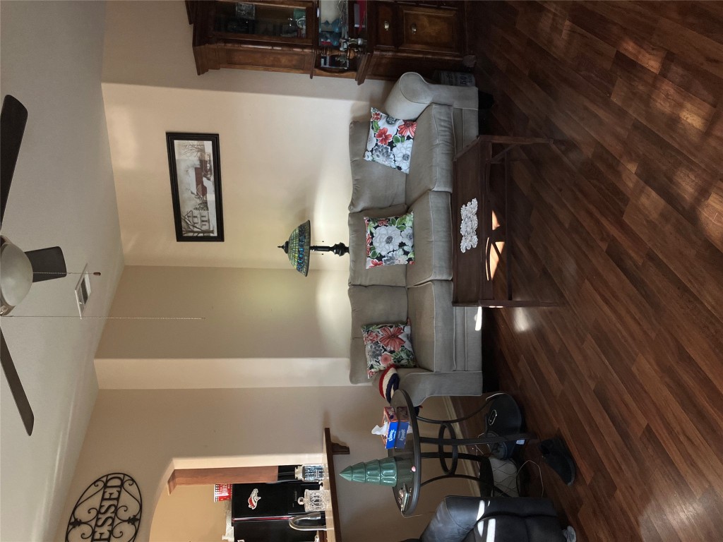 250 Engineers Pass Jarrell, TX 76537 - Photo 5 of 22 a living room with furniture and wooden floor