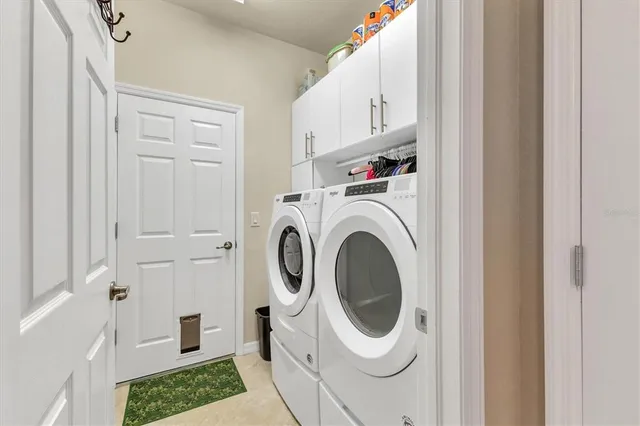 an aerial view of a house with a lake view