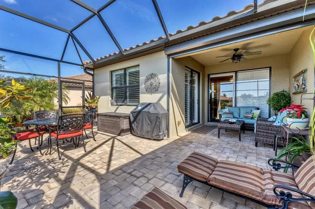 a view of a livingroom with furniture window and wooden floor