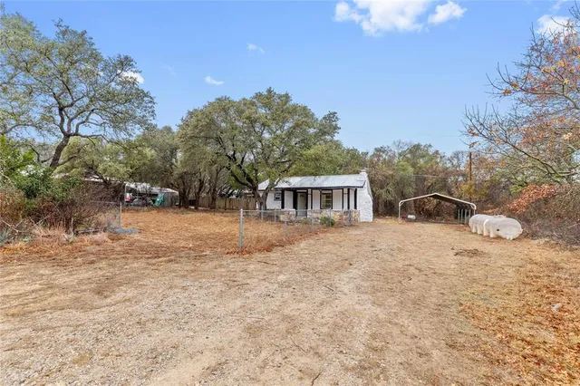 a view of an empty room with a large window