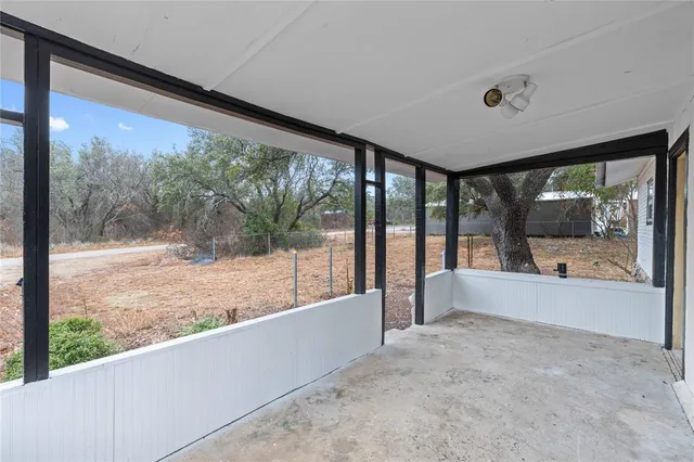 a view of a livingroom with a ceiling fan