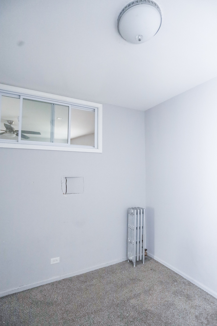 4400 North Magnolia Avenue, Unit 321 Chicago, IL 60640 - Photo 10 of 12 a view of an empty room