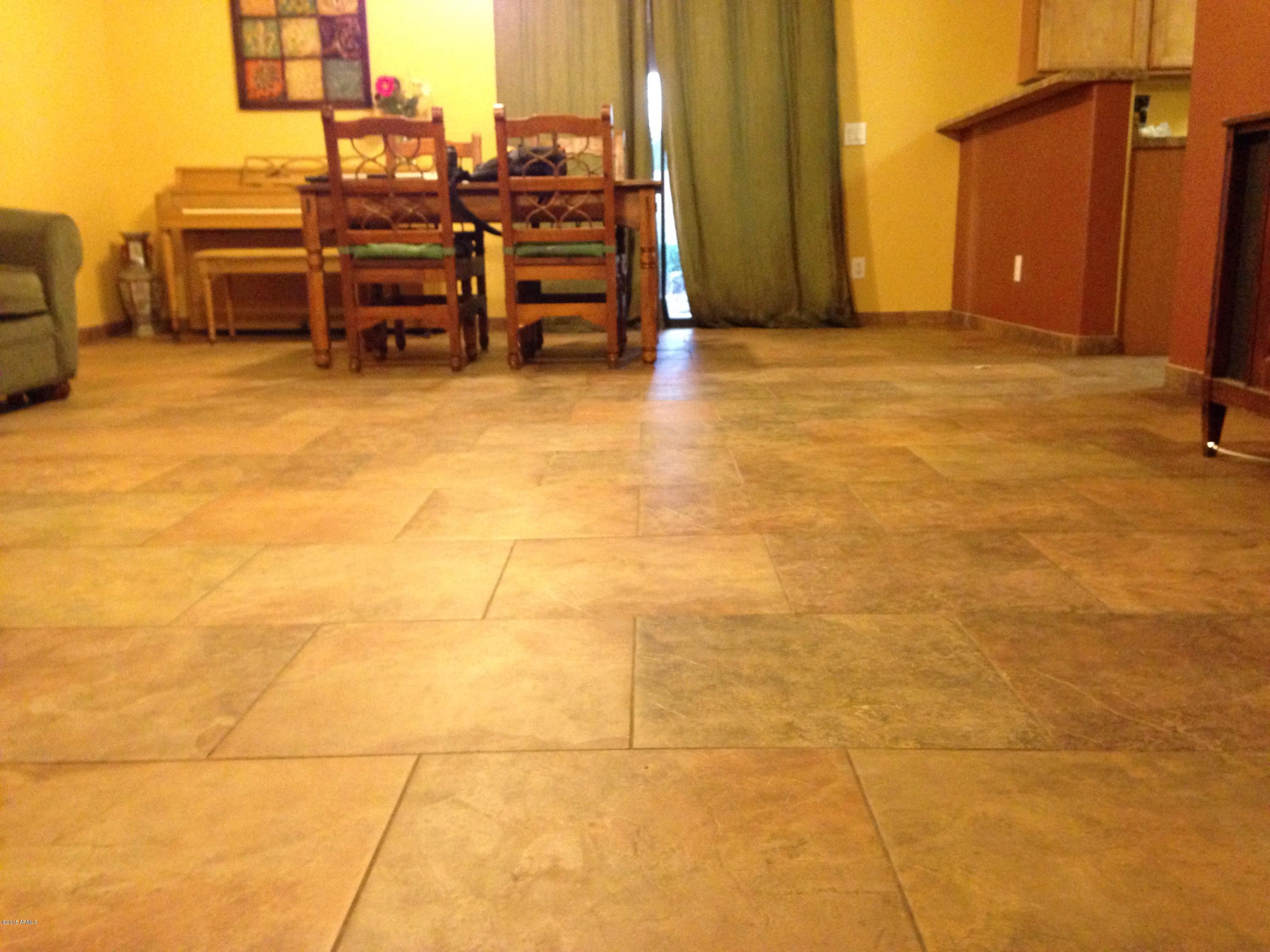 1112 West Carson Road Phoenix, AZ 85041 - Photo 40 of 40 18" Tile Floors