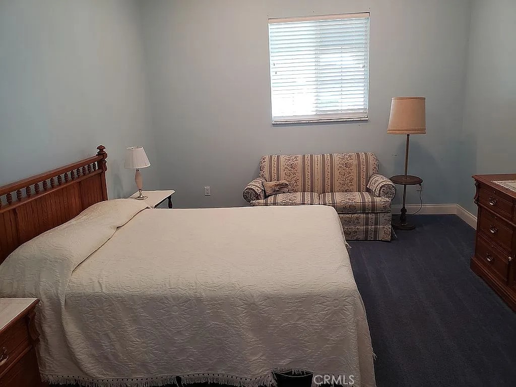 1360 South Waterview Drive Inverness, FL 34450 - Photo 12 of 34 a bedroom with a bed and wooden floor