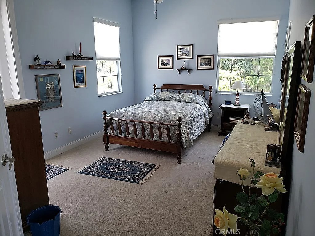 1360 South Waterview Drive Inverness, FL 34450 - Photo 15 of 34 a spacious bedroom with a bed and a window