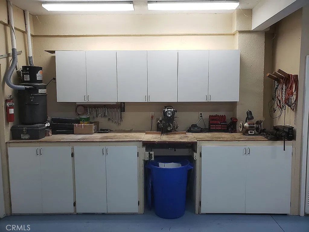 1360 South Waterview Drive Inverness, FL 34450 - Photo 32 of 34 a kitchen with stainless steel appliances granite countertop a sink and cabinets