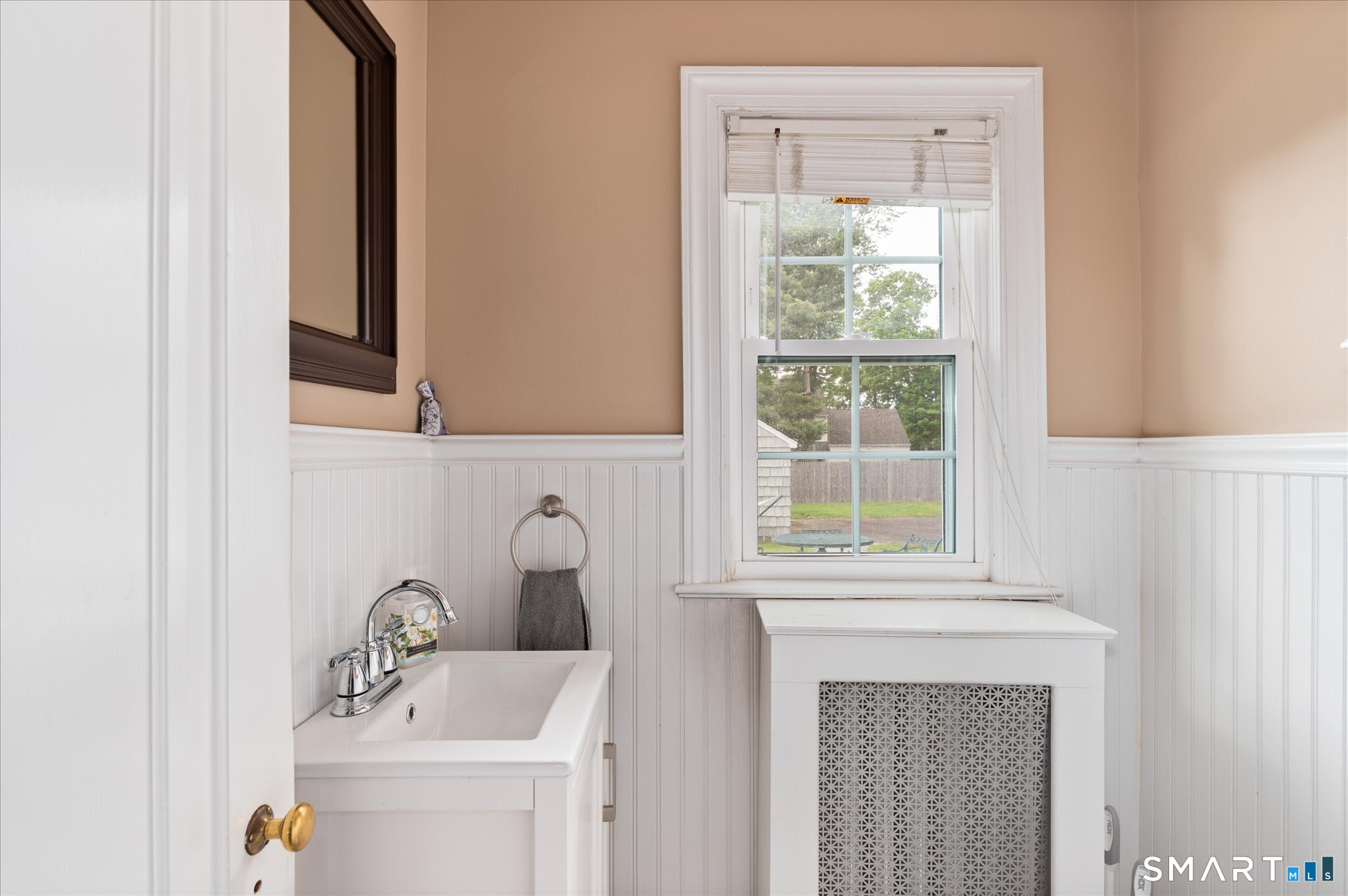 250 High Ridge Road Stamford, CT 06905 - Photo 10 of 22 First floor powder room with new vanity