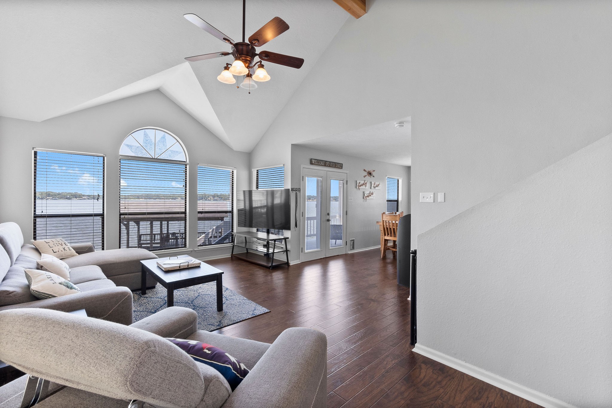 154 Point Drive Onalaska, TX 77360 - Photo 12 of 46 a living room with furniture fireplace and a large window