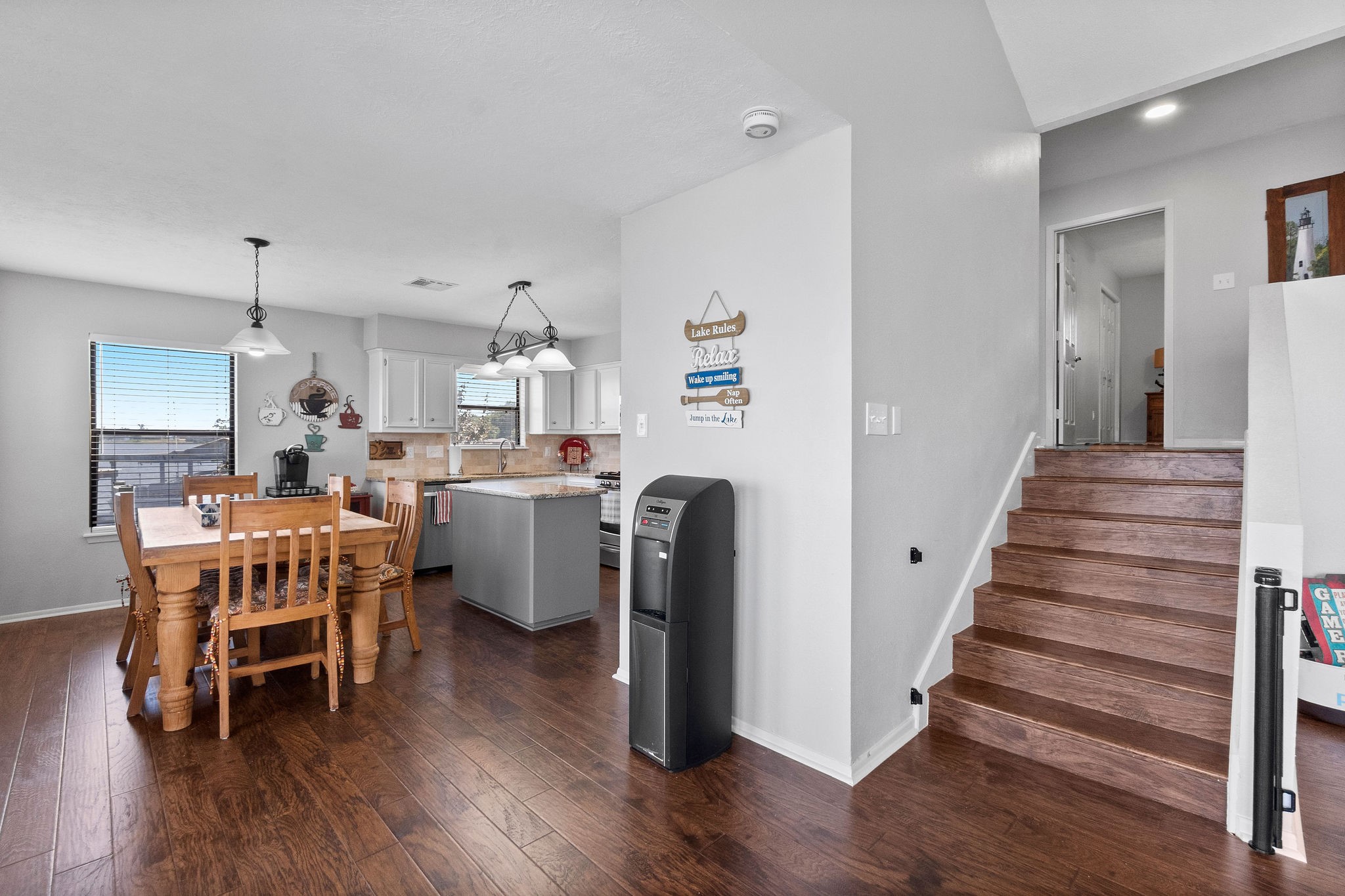 154 Point Drive Onalaska, TX 77360 - Photo 16 of 46 a dining room with furniture and wooden floor