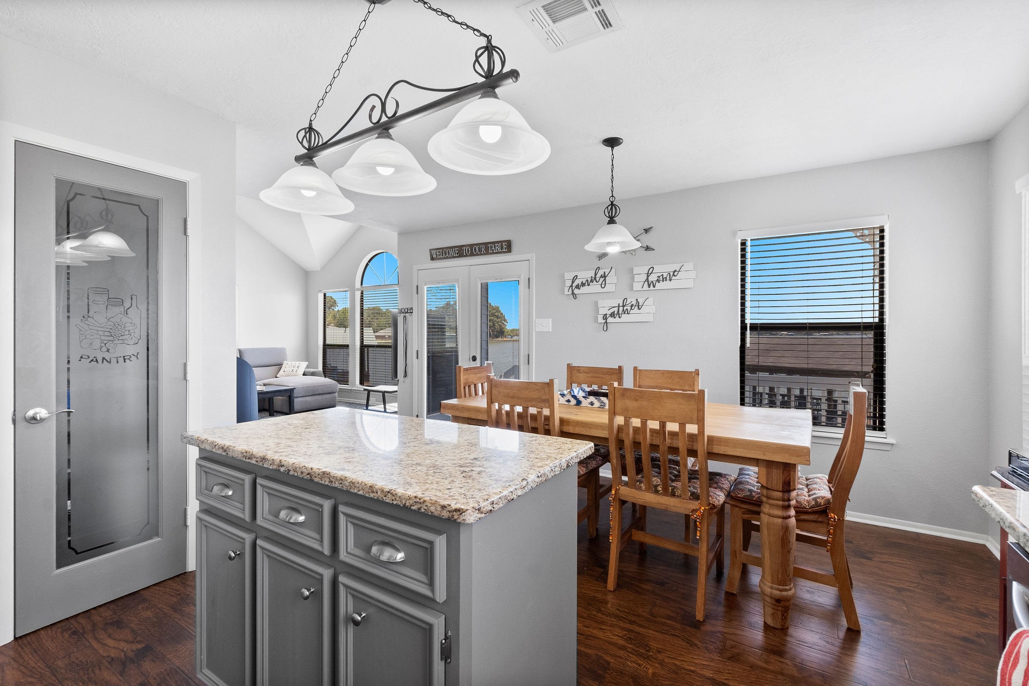 154 Point Drive Onalaska, TX 77360 - Photo 19 of 46 a view of a dining room with furniture window and wooden floor