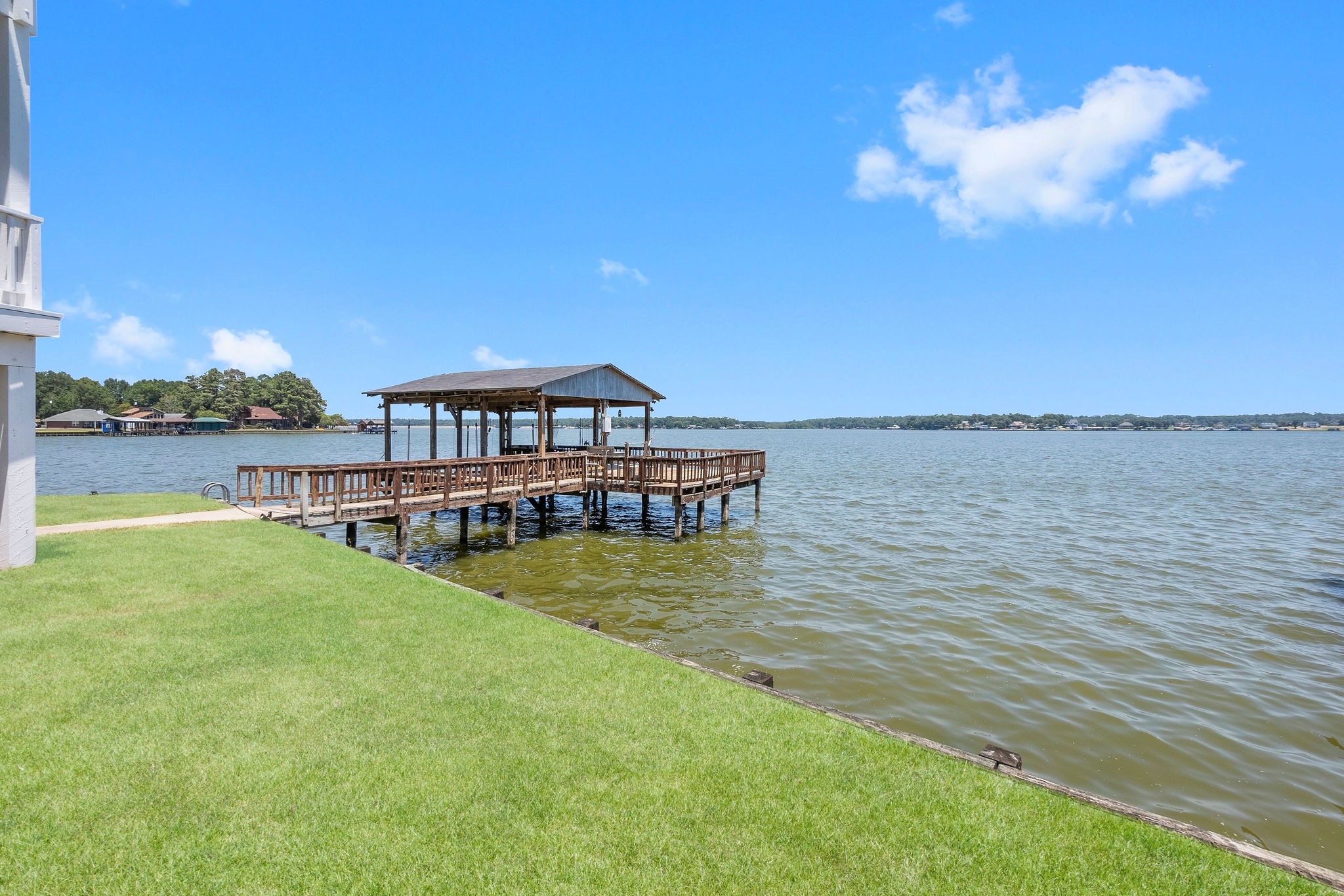 154 Point Drive Onalaska, TX 77360 - Photo 39 of 46 a view of a house with pool and ocean view