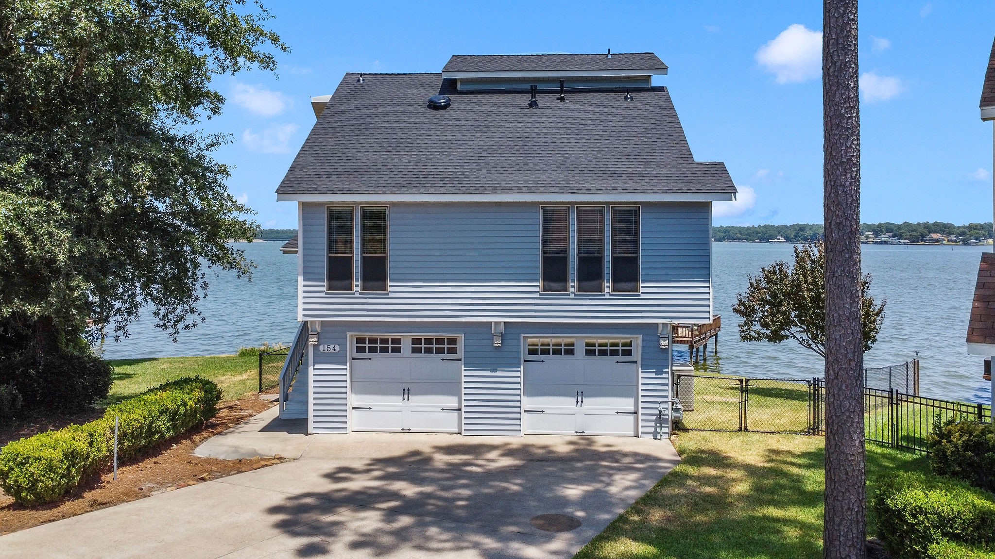 154 Point Drive Onalaska, TX 77360 - Photo 7 of 46 a aerial view of a house with swimming pool