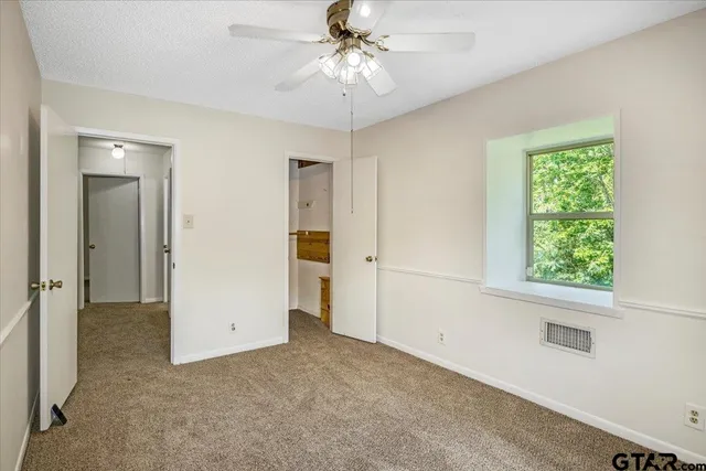 a view of a room with an empty space