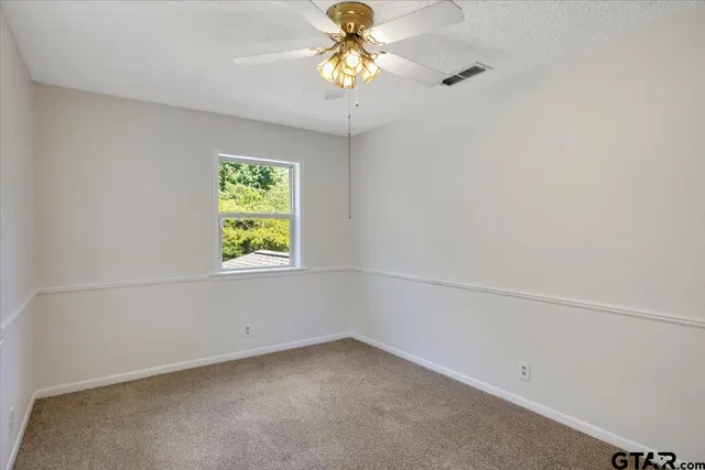 a view of room with cabinets