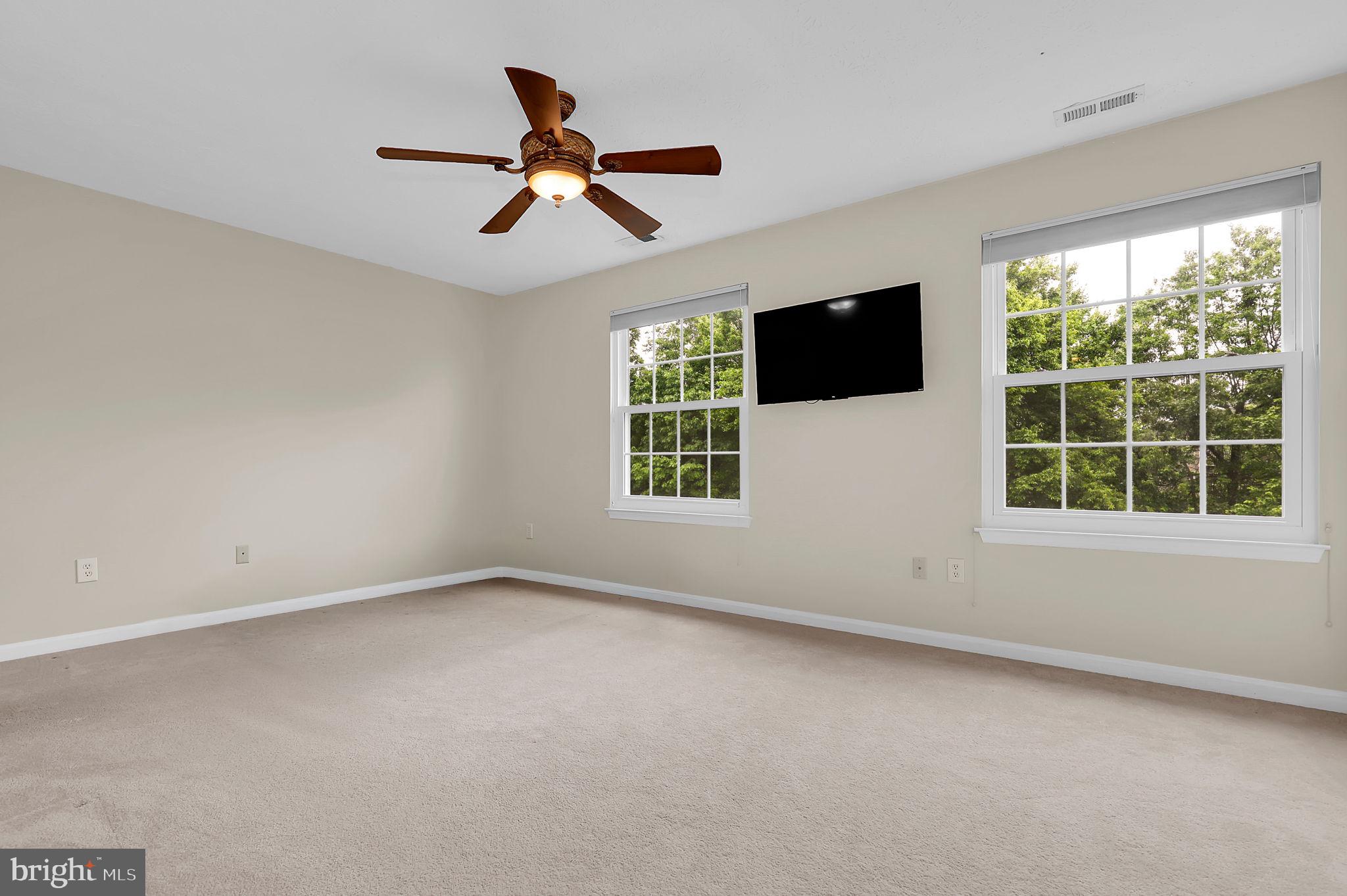 7150 Natures Road Columbia, MD 21046 - Photo 16 of 45 a view of an empty room with a window