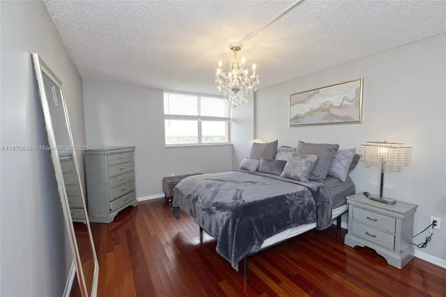 a view of front door with wooden floor