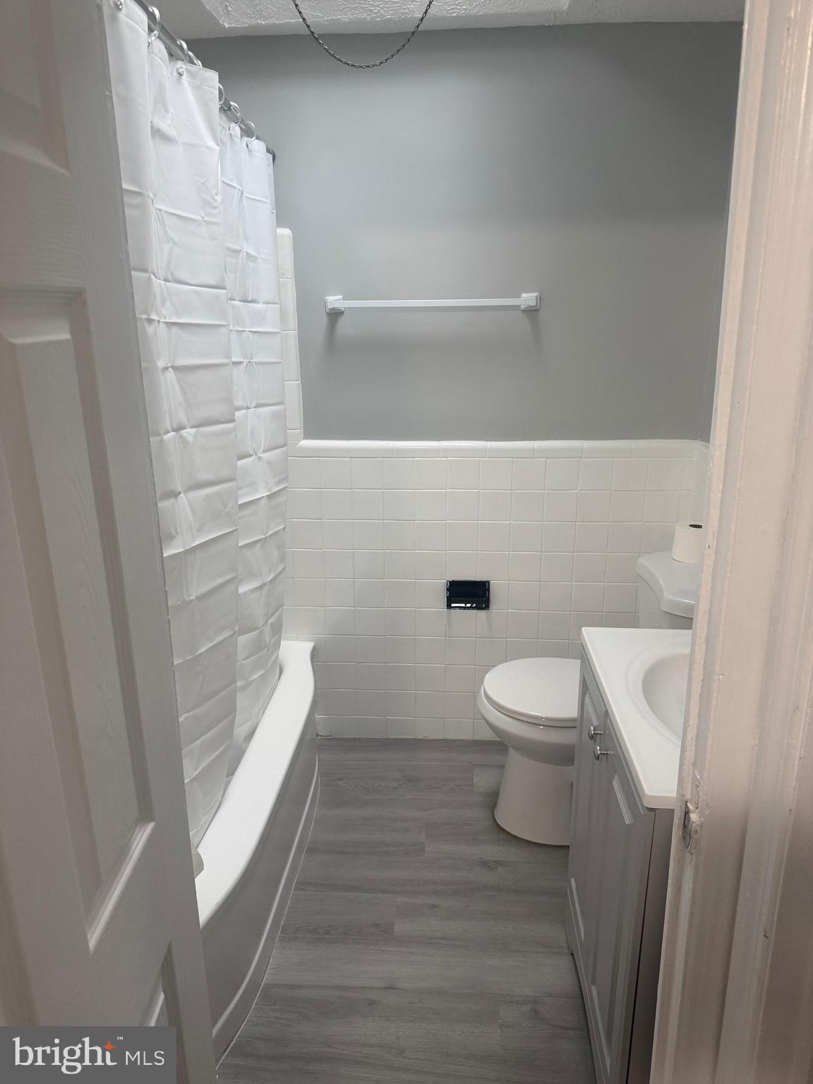 203 Cambridge Road Clifton Heights, PA 19018 - Photo 13 of 13 a bathroom with a toilet and a shower
