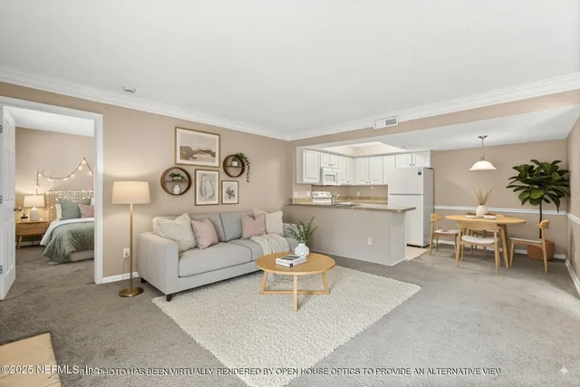 a living room with furniture and a table