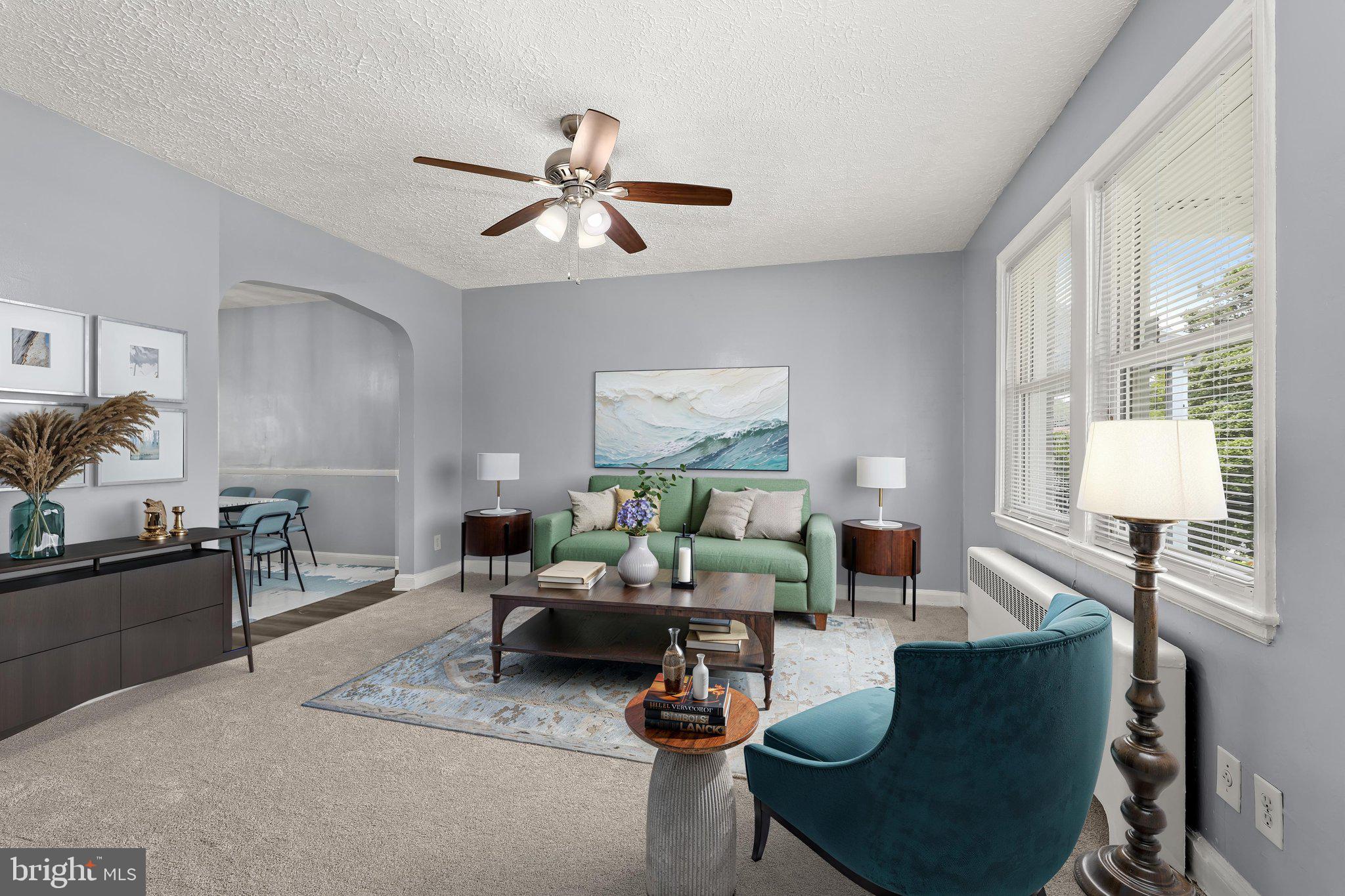 6105 Frederick Road Baltimore, MD 21228 - Photo 2 of 30 Living Room Staged Using Virtual Tools