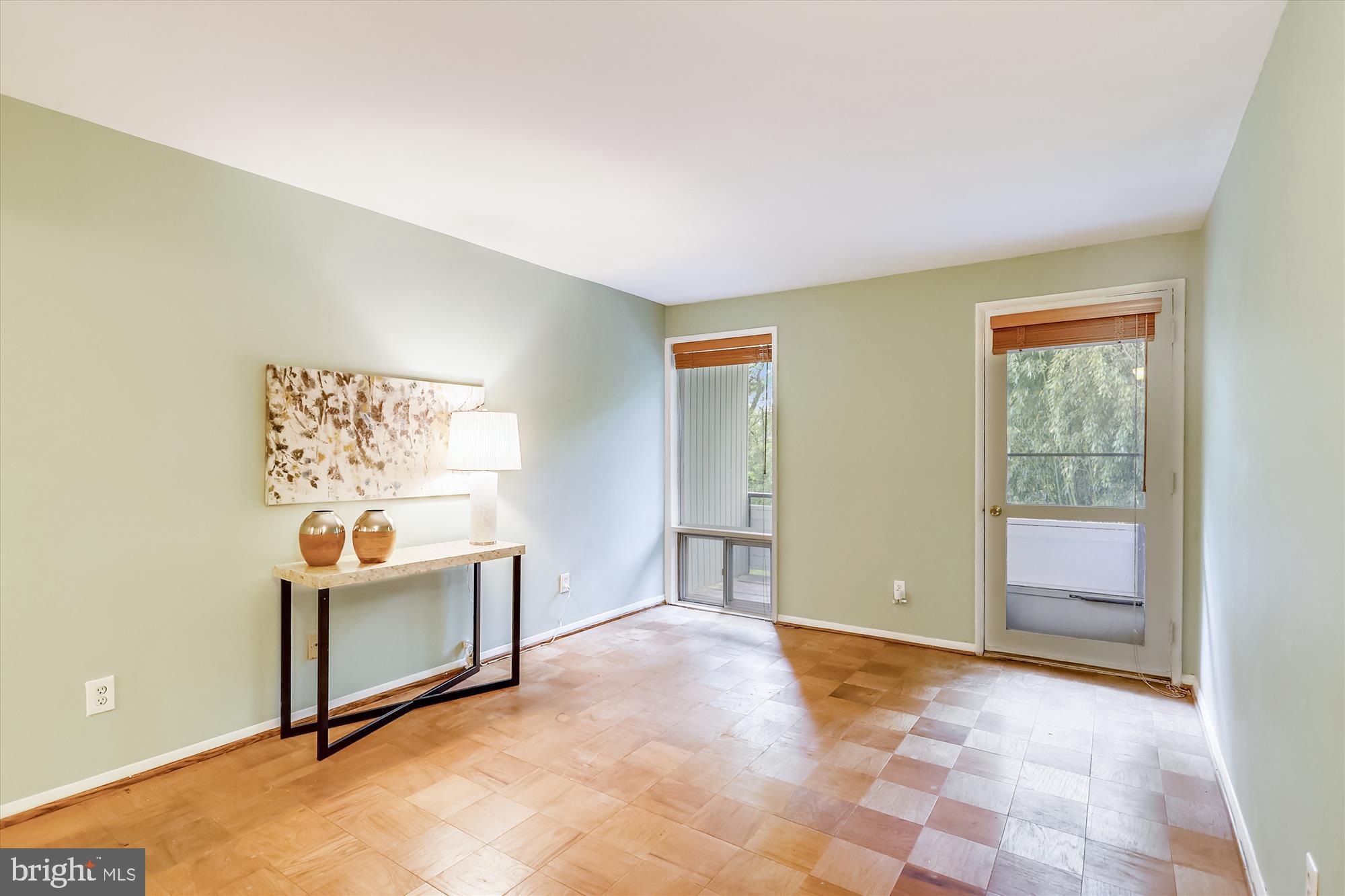 7519 Spring Lake Drive, Unit B1 Bethesda, MD 20817 - Photo 13 of 36 Master bedroom with door to balcony