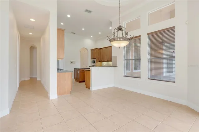 a bathroom with a toilet sink and shower