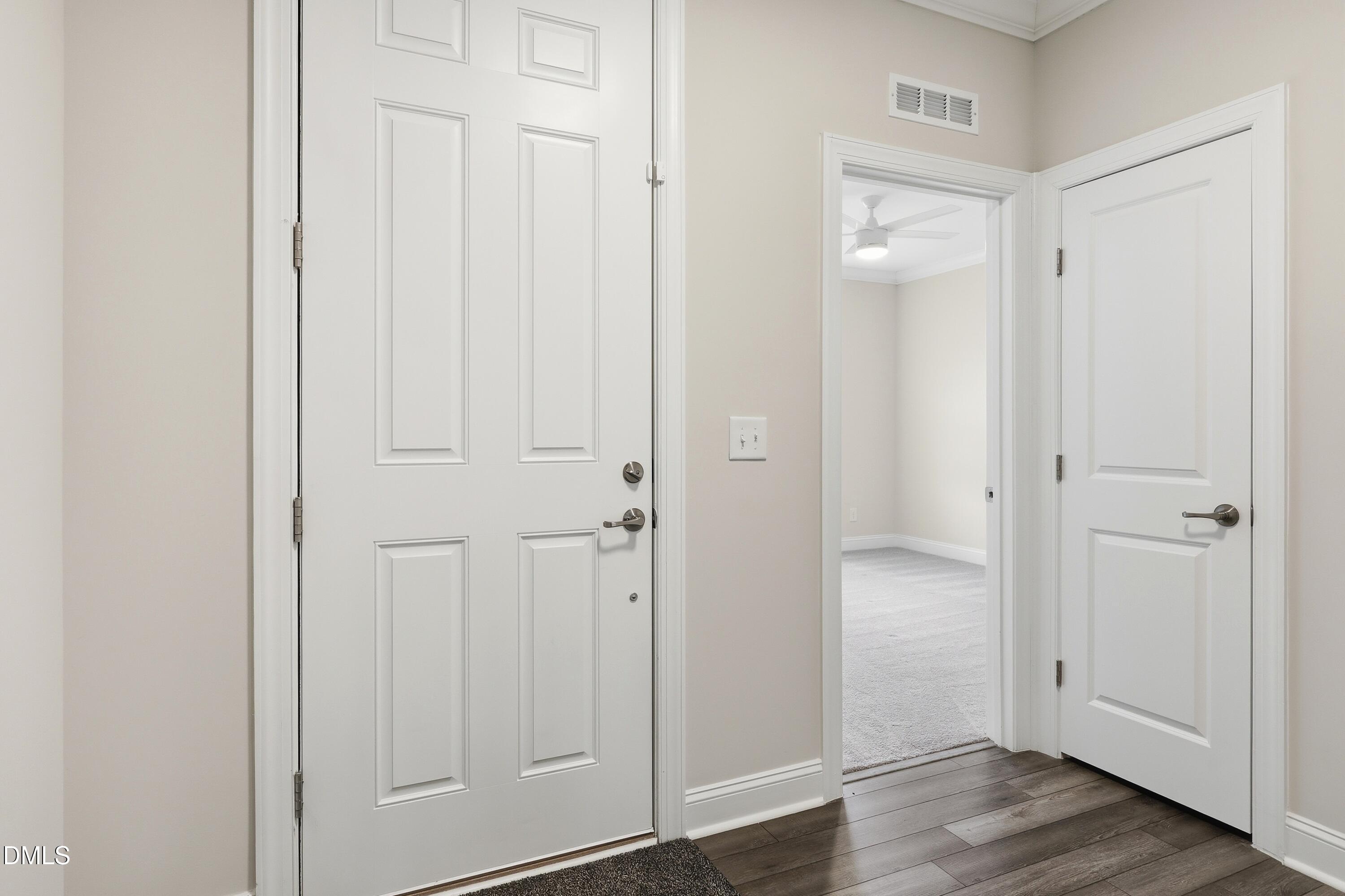 289 English Violet Lane Raleigh, NC 27610 - Photo 5 of 40 an empty room with wooden floor