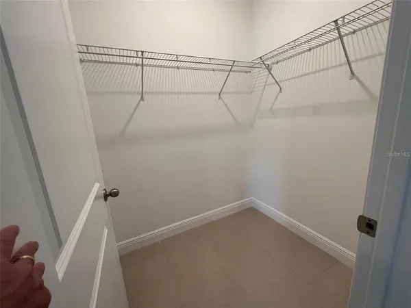 a view of a room with racks on the wall