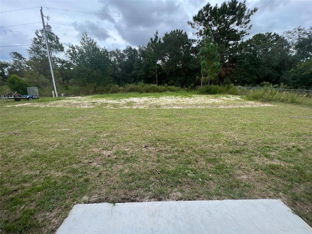 15087 Southwest 51st Terrace Ocala, FL 34473 - Photo 14 of 14 a view of a outdoor space