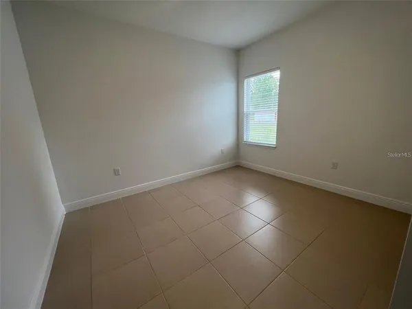 an empty room with a window