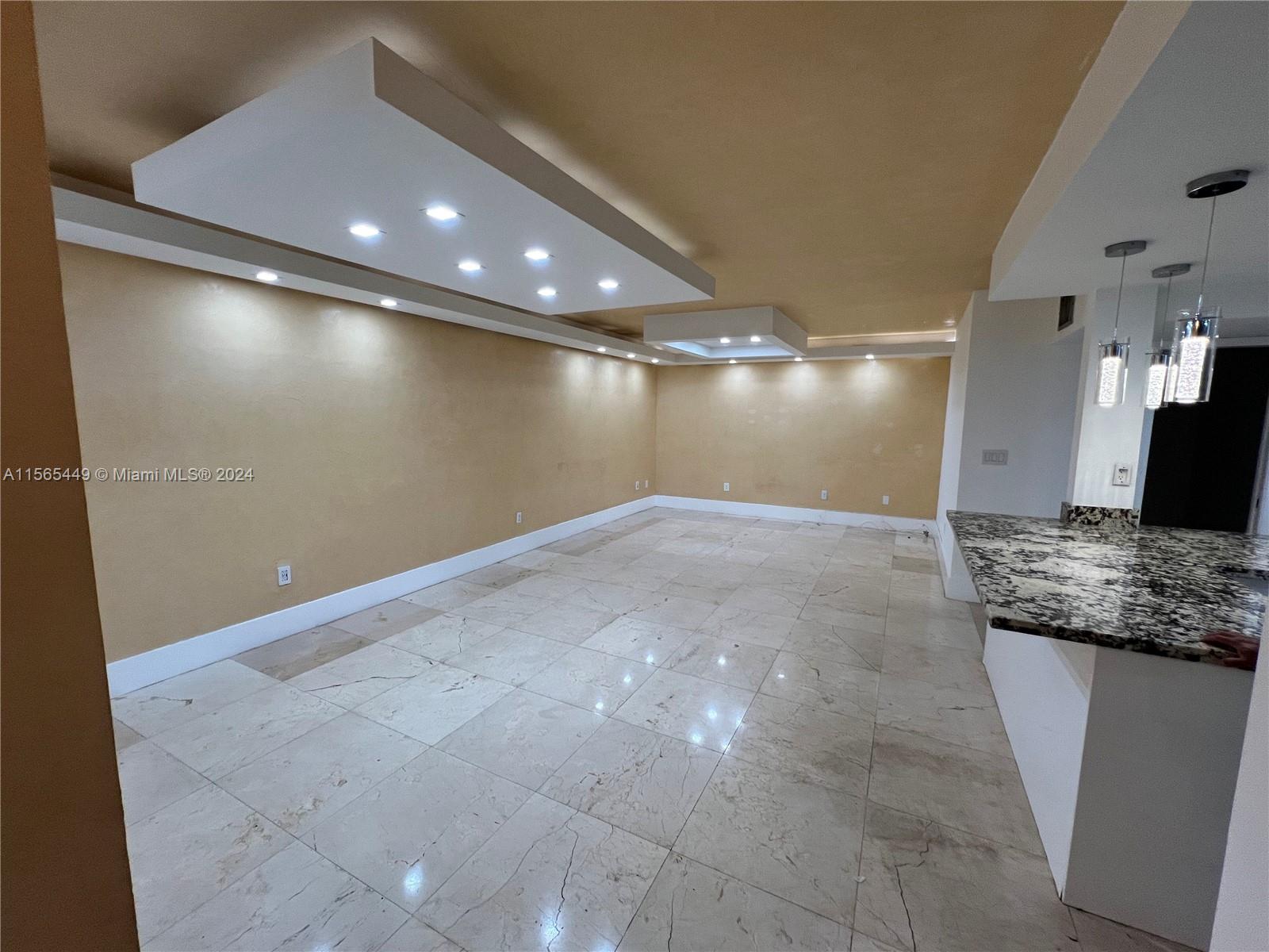 California Club Miami, FL 33179 - Photo 7 of 21 a view of a kitchen with a sink and a refrigerator