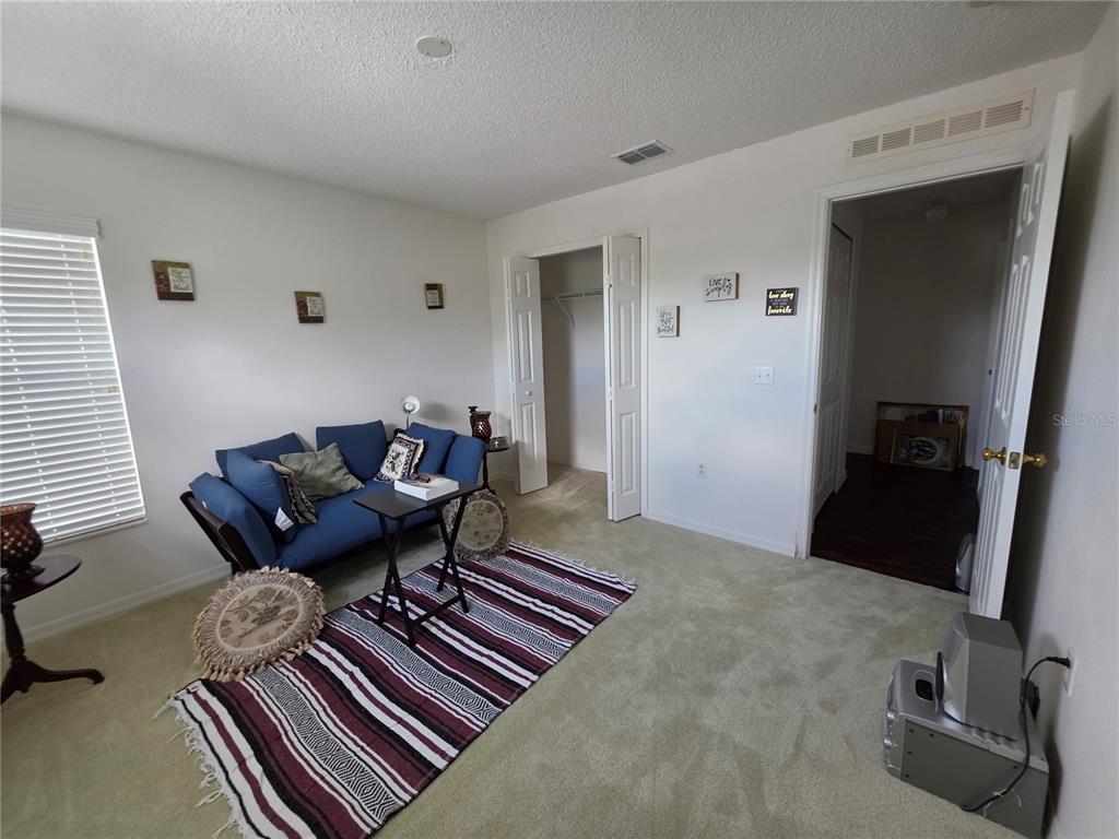 9276 Elm Court Spring Hill, FL 34606 - Photo 25 of 35 a living room with furniture