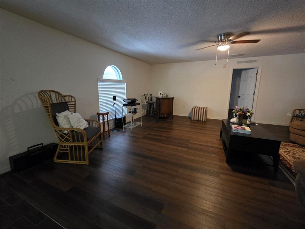 9276 Elm Court Spring Hill, FL 34606 - Photo 8 of 35 a living room with furniture