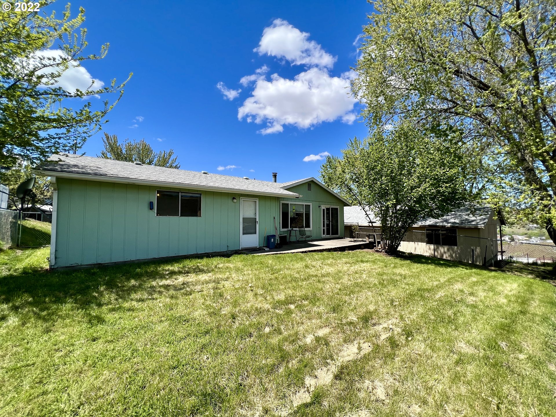 716 Southeast 10th Street Pendleton, OR 97801 - Photo 6 of 18 a view of a house with a patio