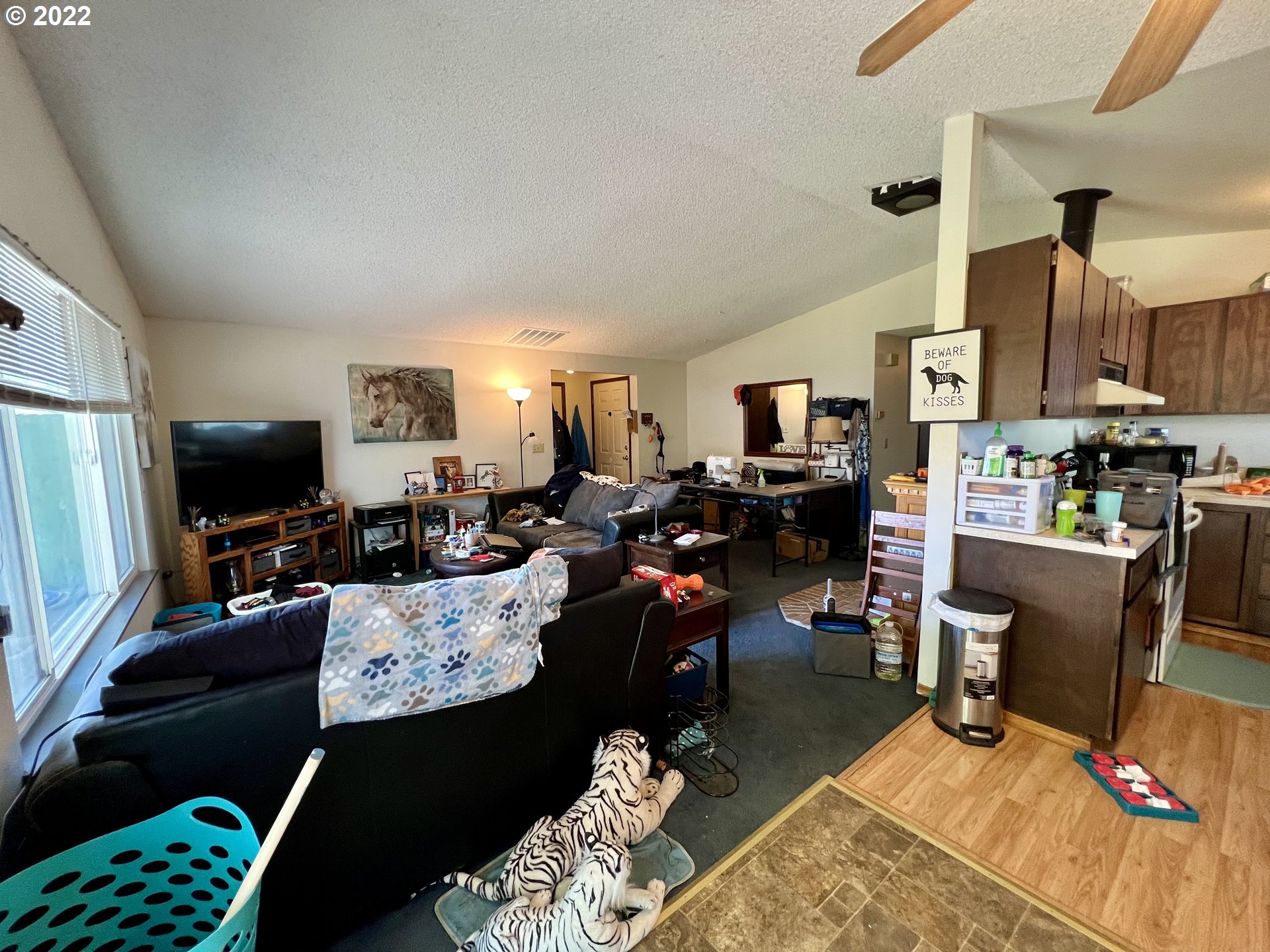 716 Southeast 10th Street Pendleton, OR 97801 - Photo 8 of 18 a living room with furniture and a flat screen tv