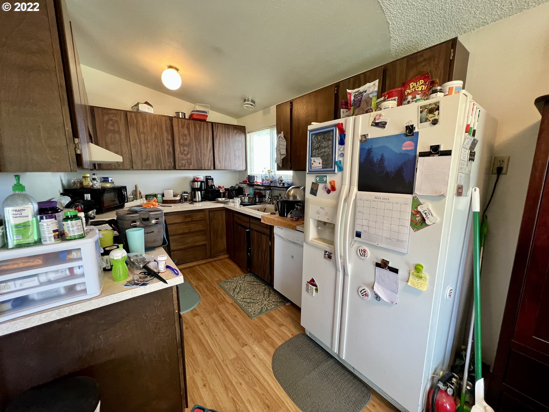 716 Southeast 10th Street Pendleton, OR 97801 - Photo 9 of 18 a kitchen with stainless steel appliances a stove a refrigerator a sink a stove a refrigerator a counter top space and cabinets
