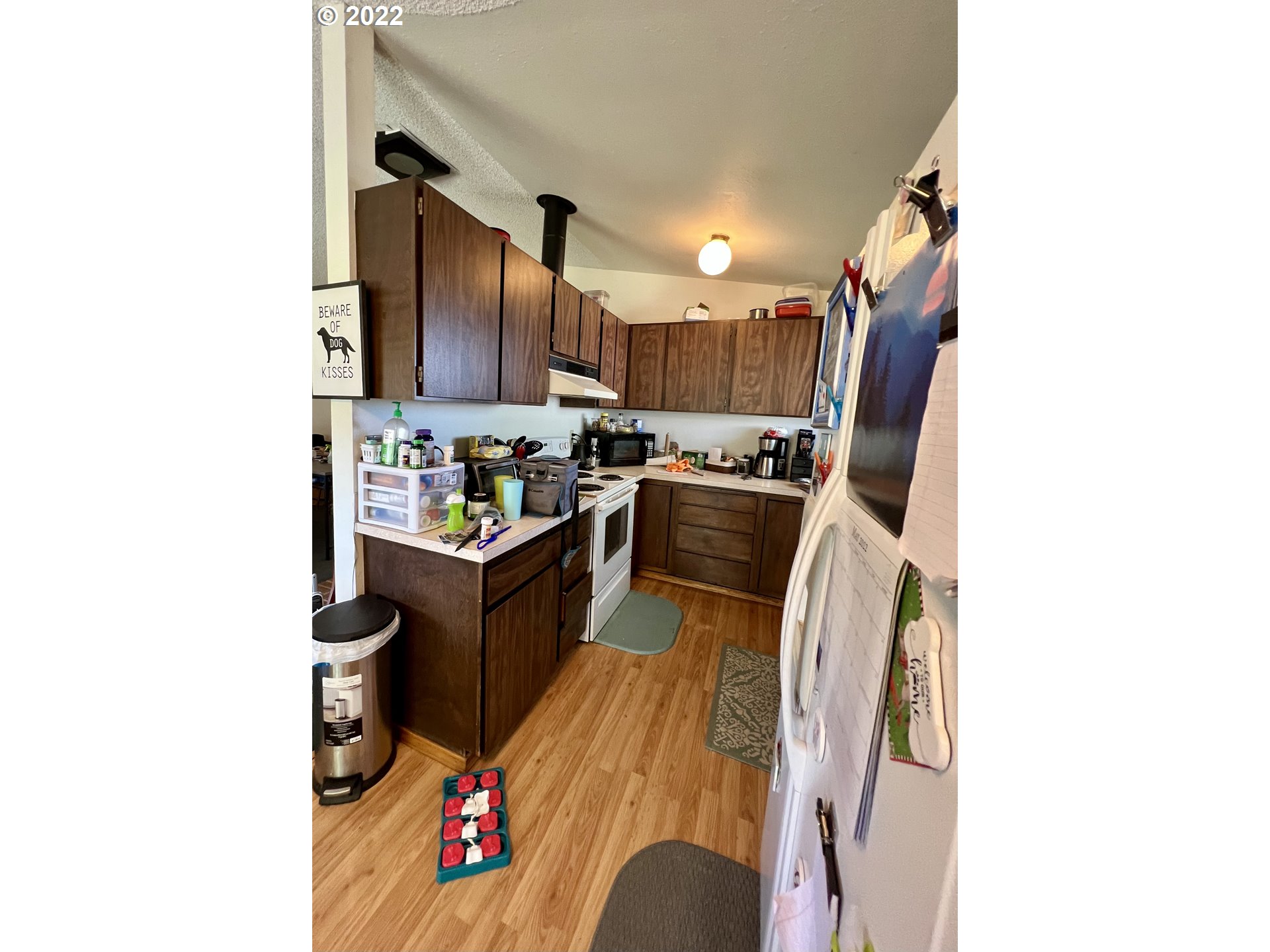 716 Southeast 10th Street Pendleton, OR 97801 - Photo 10 of 18 a kitchen with stainless steel appliances granite countertop a refrigerator sink and stove
