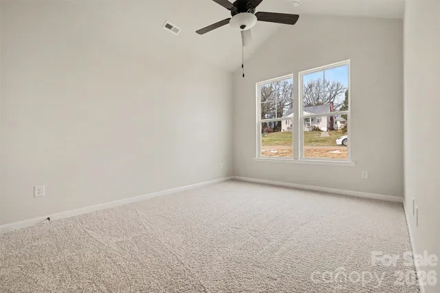 en empty room with windows