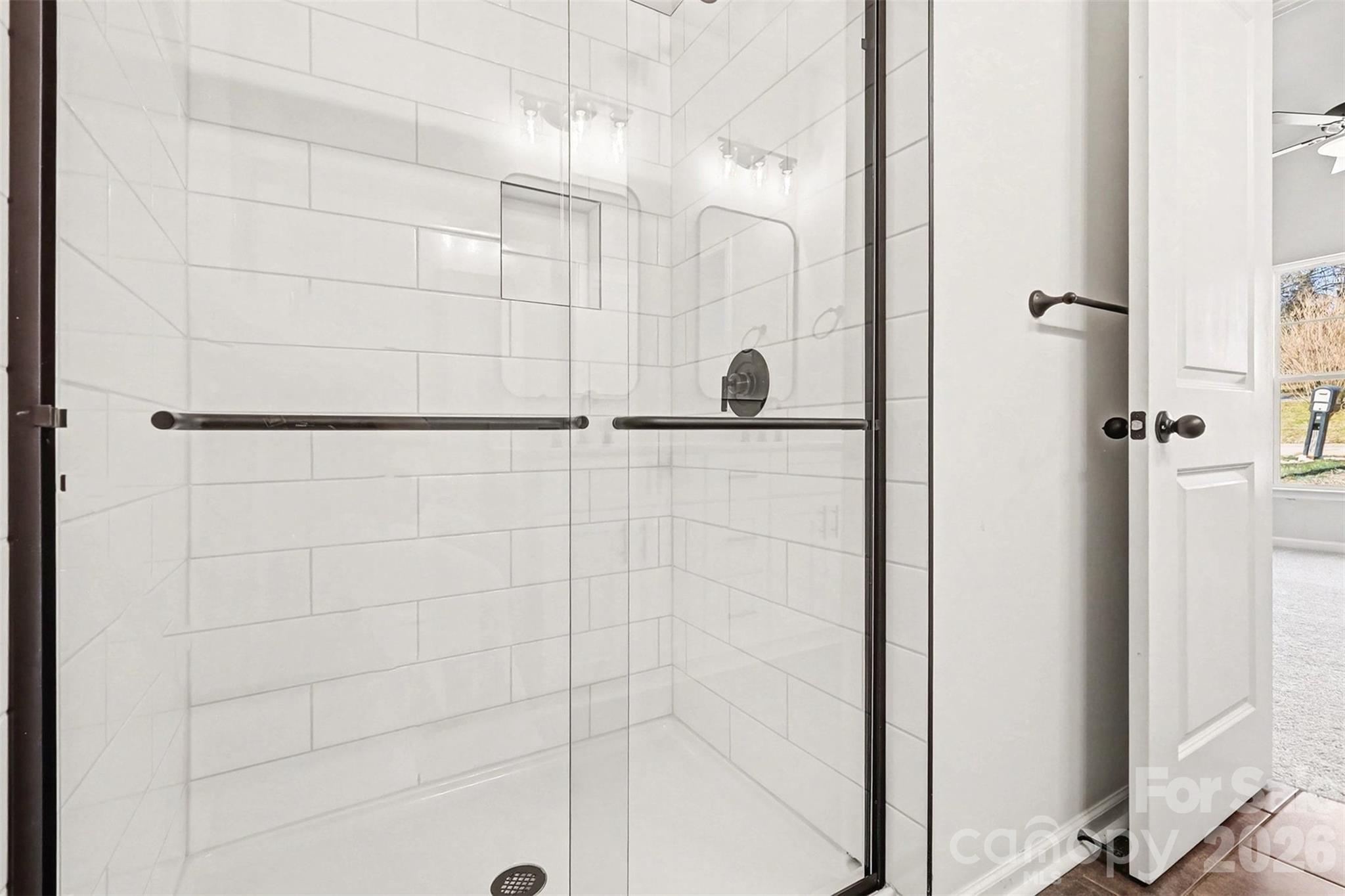 508 Mill Street Lowell, NC 28098 - Photo 15 of 27 a bathroom with a shower