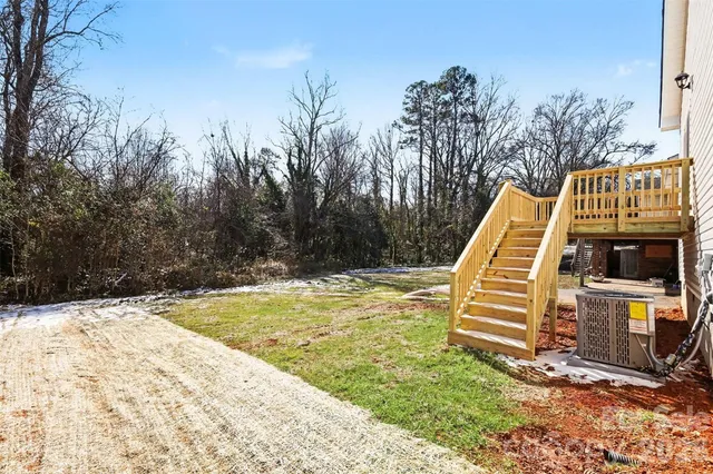 a view of swimming pool with a backyard