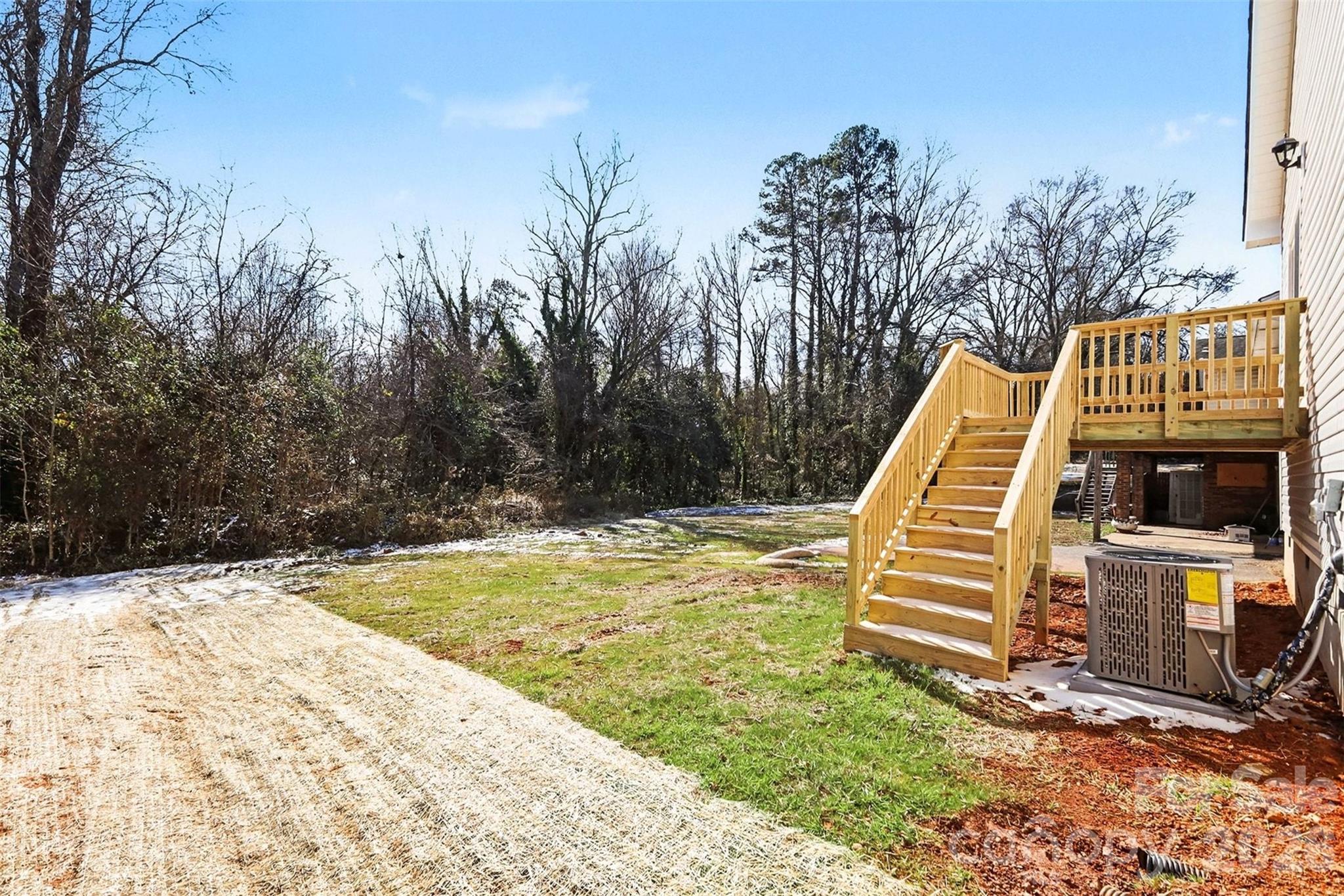 508 Mill Street Lowell, NC 28098 - Photo 26 of 27 a view of swimming pool with a backyard