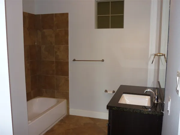 a bathroom with a bathtub
