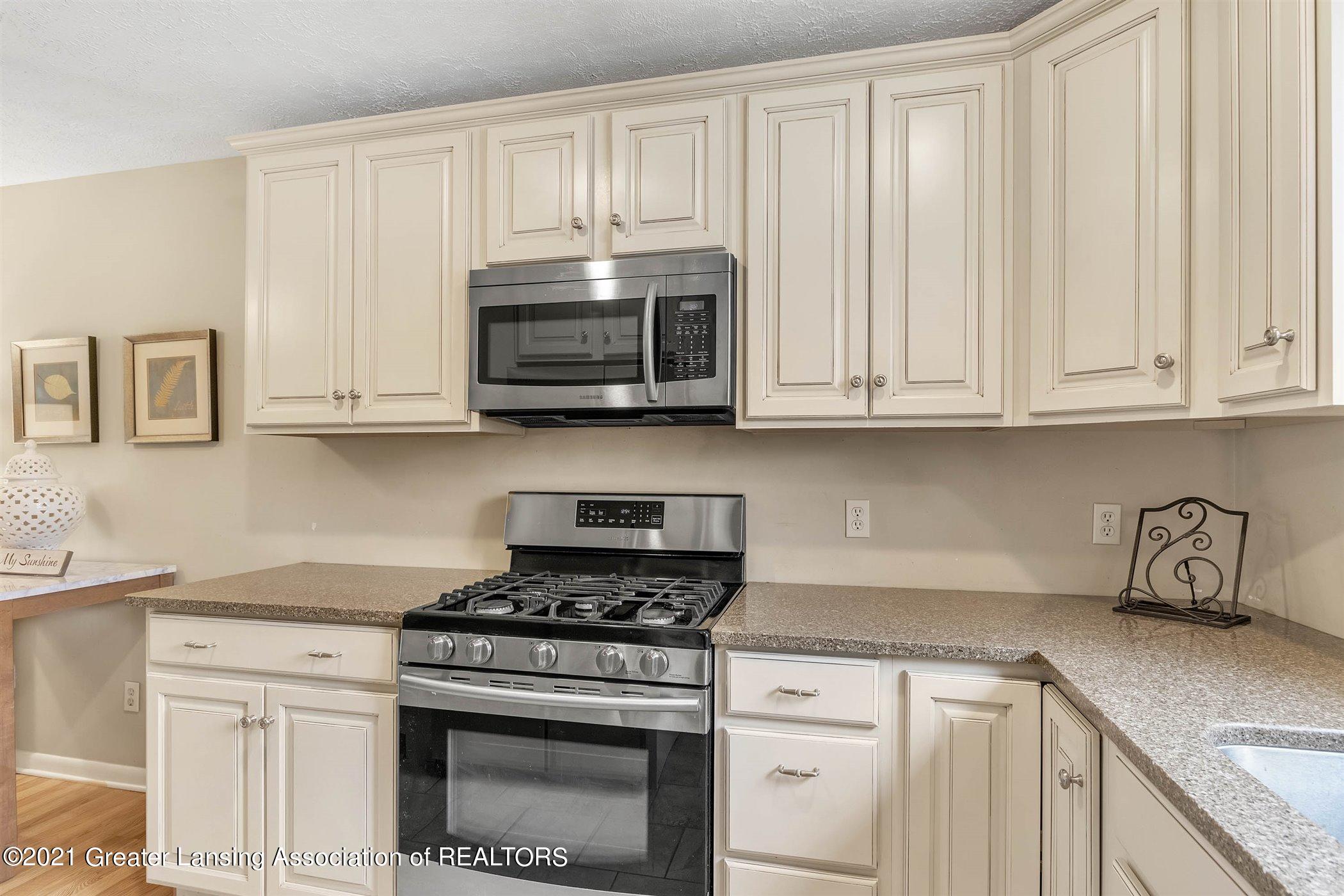 2089 East Lake Lansing Road, Unit 81 Haslett, MI 48840 - Photo 12 of 35 16-2089 Lake Lansing Rd-WindowStill-Real