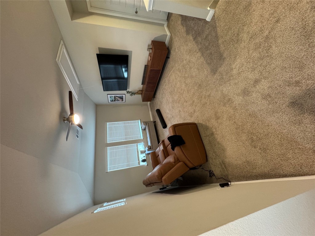 429 El Capitan Loop Dripping Springs, TX 78620 - Photo 7 of 18 Upstairs carpeted recreation room