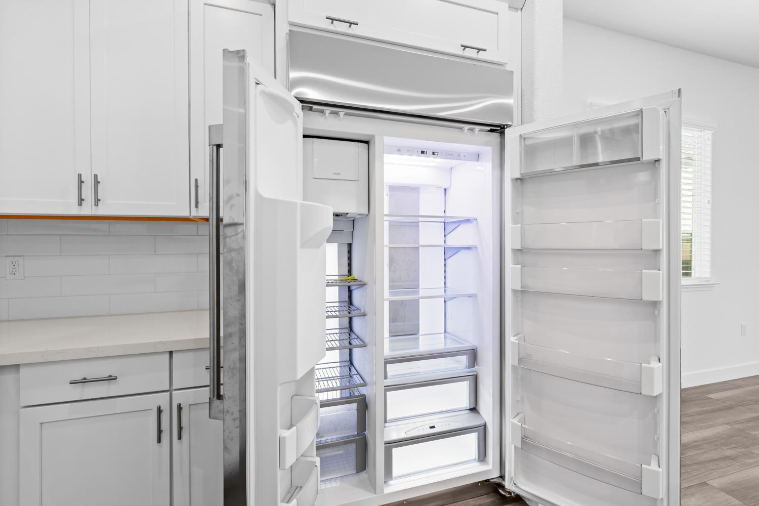4236 Bellwether Way Sacramento, CA 95835 - Photo 13 of 57 a view of walk in closet with empty racks